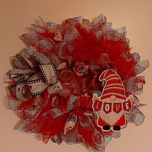 Whimsical Red Holiday Wreath with Striped Ribbon